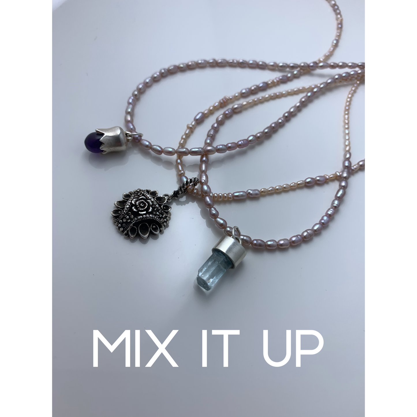 Long seed pearl necklace duo